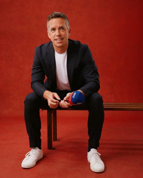 Photo by David Jones on August 09, 2024. May be an image of 1 person, playing football, suit, ball, racket, blazer and text.