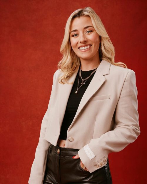 Photo by Harriet Prior on August 09, 2024. May be an image of 1 person, smiling, bolo tie, blazer, jacket, top and suit.